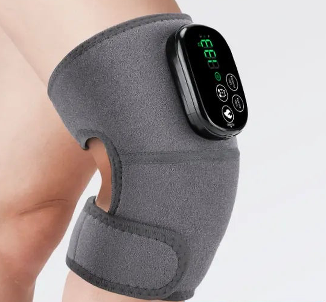GlowKnee wrap on the knee showing the one-button controller